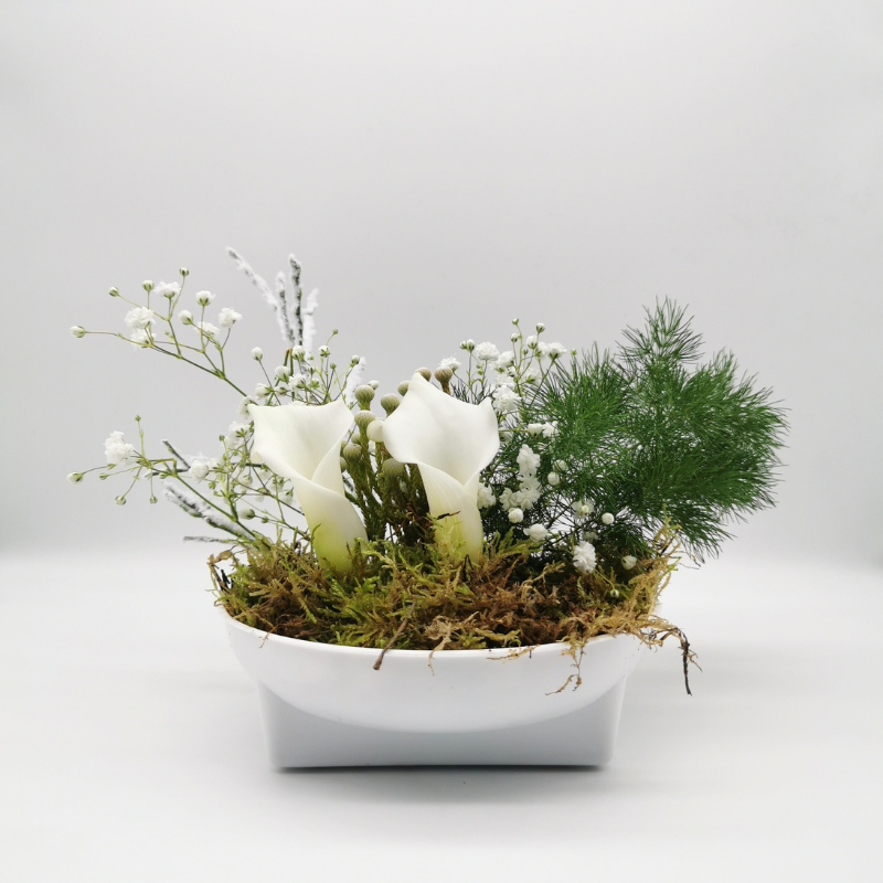 Écrin végétal de callas immaculés