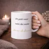 Mug Un petit cœur entre des mains pleines de douceur